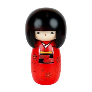 Röd Kokeshi-docka